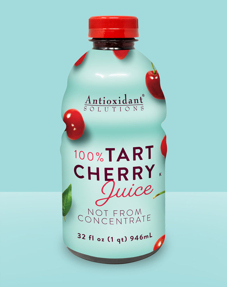 A blue bottle of tart cherry juice with a blue background.